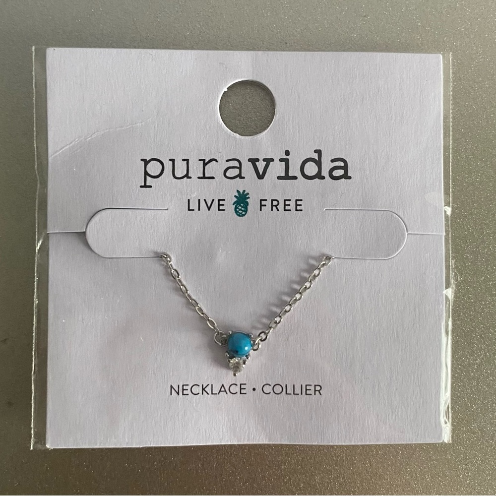 Pura vida silver necklace with blue charm and diamond